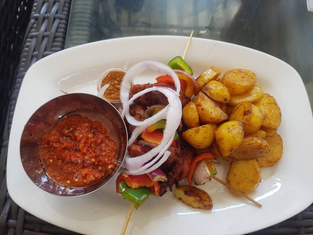 Dodo: Its a fried plantain served with local sauce(made from pepper and locust beans)