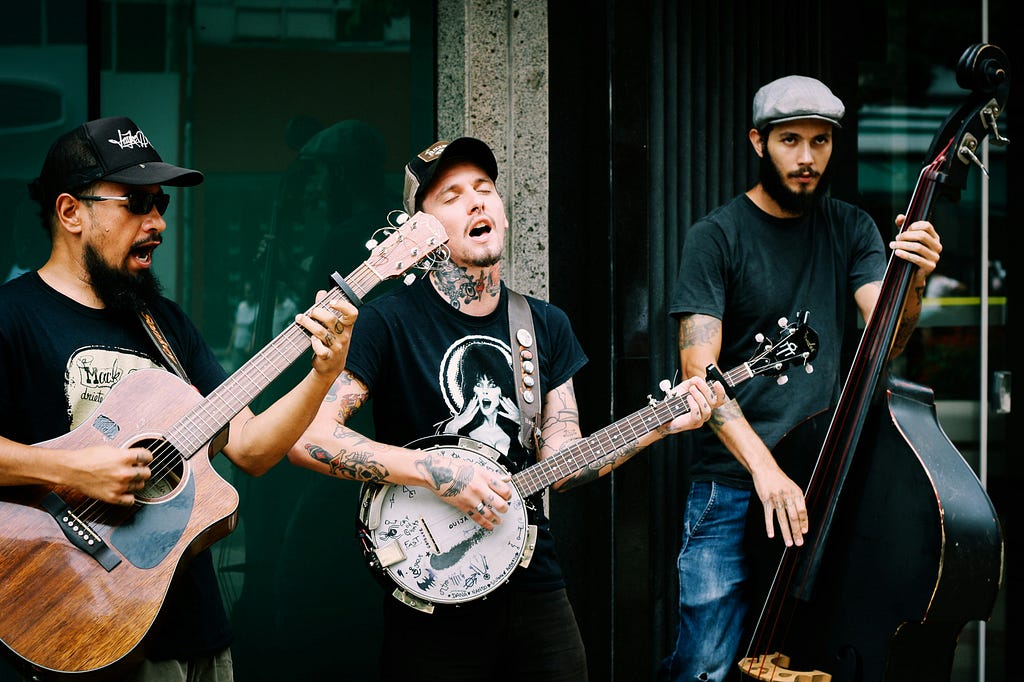 band with guitars performing music