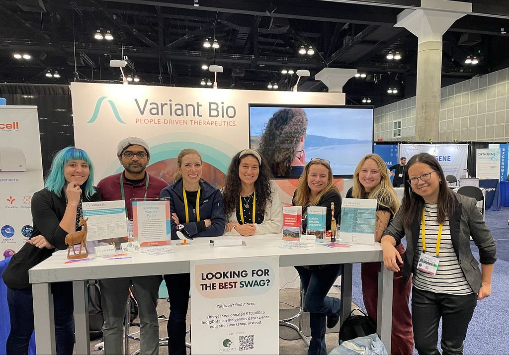 Iman Hamid (center) with fellow team members from Variant Bio at the 2022 American Society of Human Genetics (ASHG) Conference