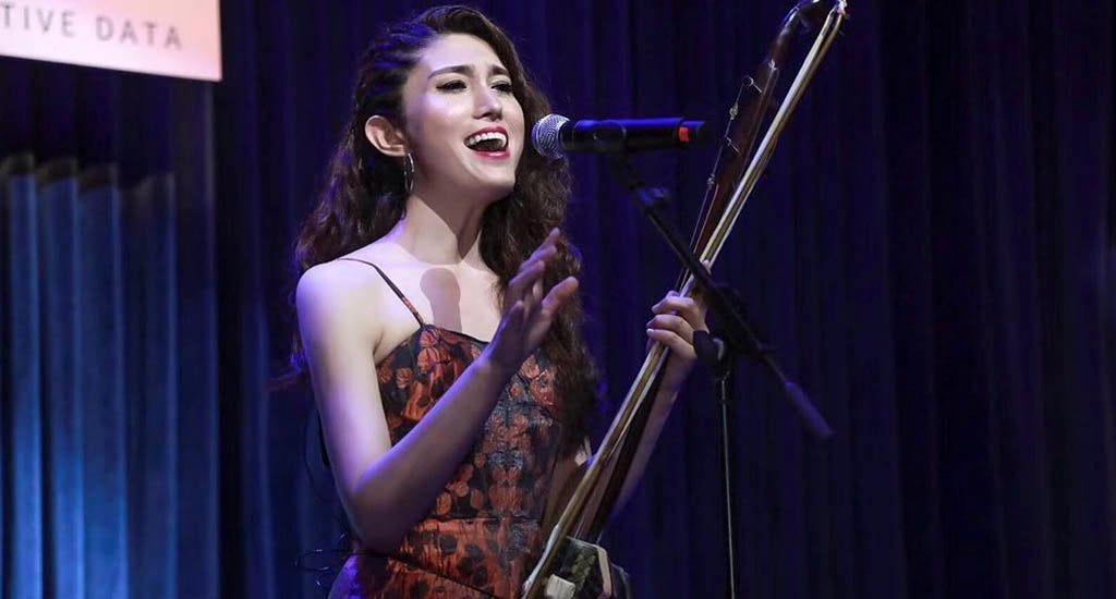 Chinese songwriter Feifei Yang singing at Blue Note Beijing