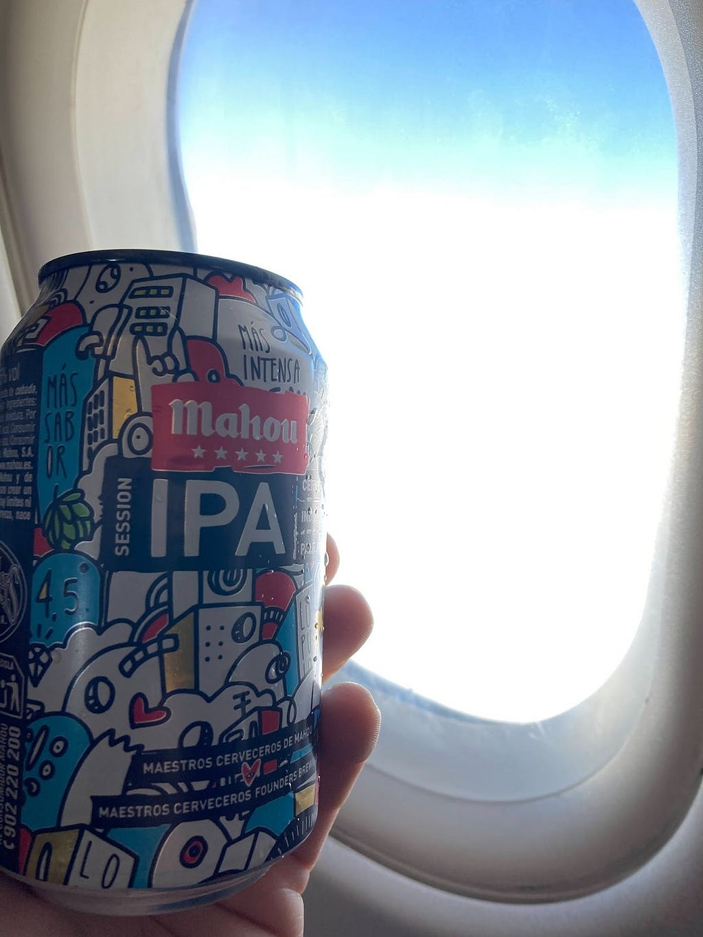 Can of beer on plane