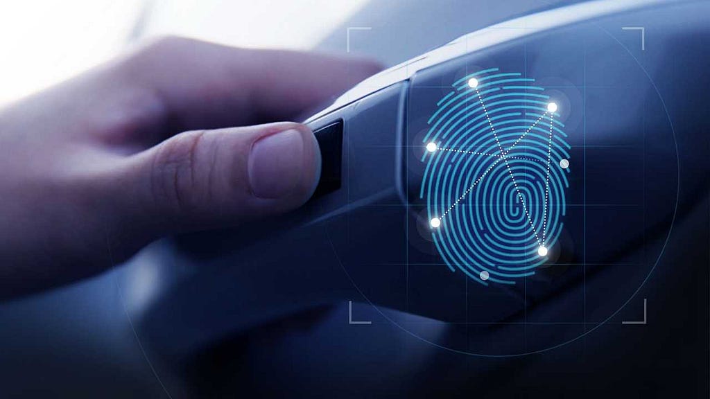 Photo of a fingerprint sensor integrated into the door of a car