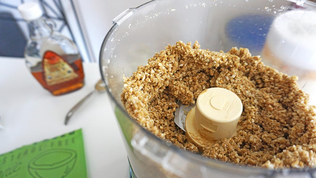 ginger turmeric bone broth protein bites being made in food processor