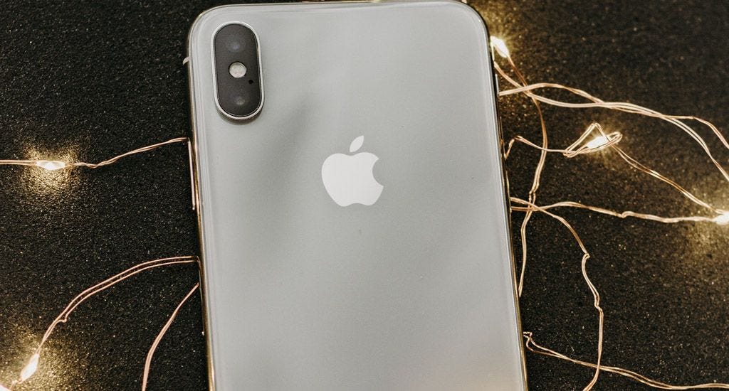 Apple iPhone tangled in lights