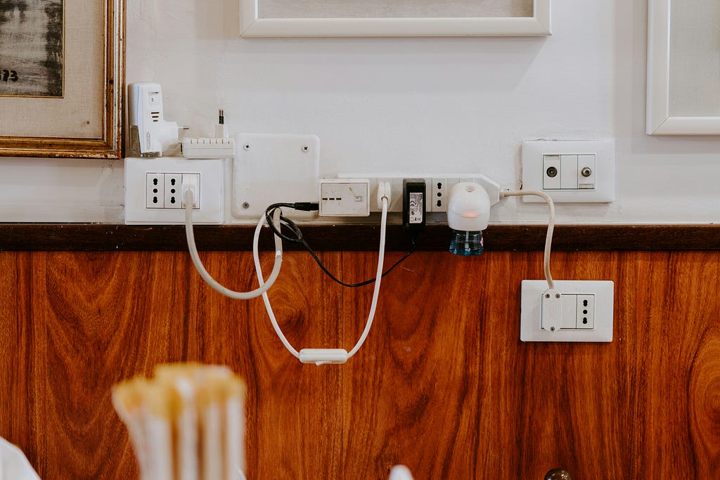 Images of smart power strips being used at home