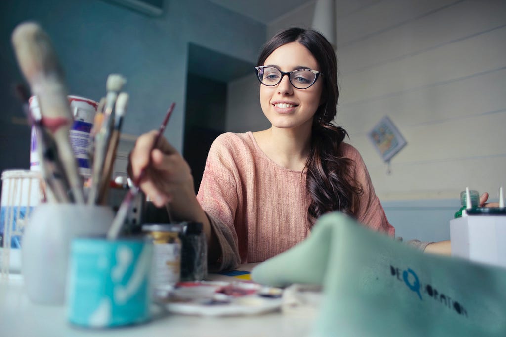 A woman painting a picture