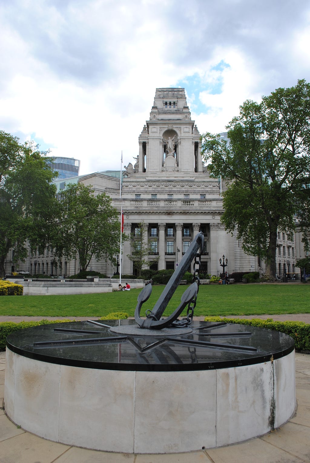 An anchor monument in front of a state building