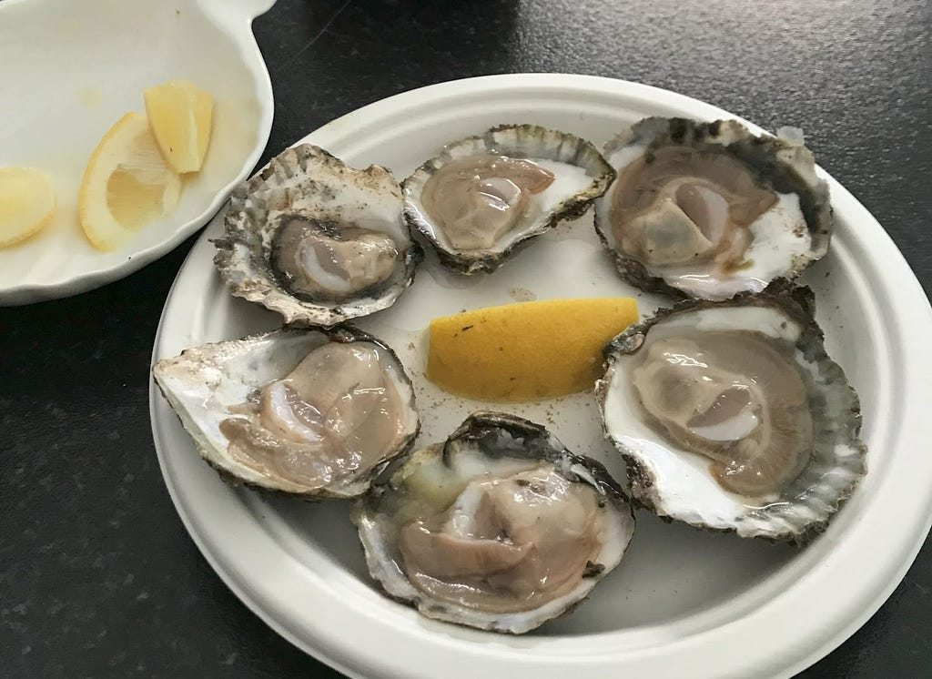 An oyster dish with lemon