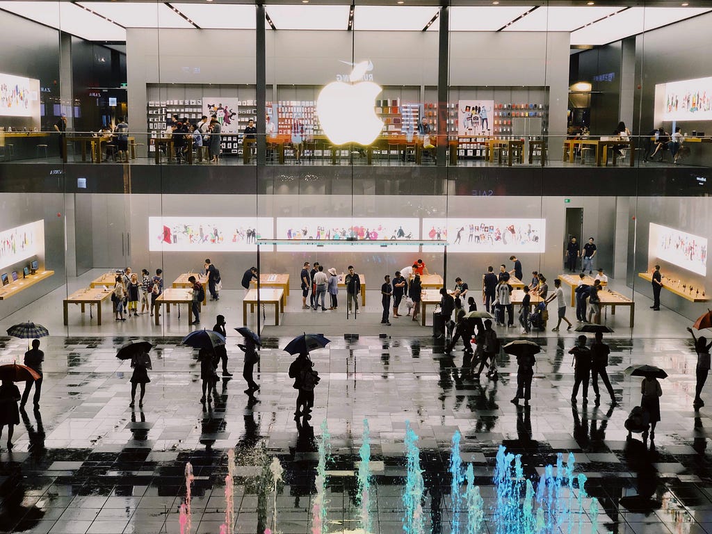 people queuing in front of Apple store