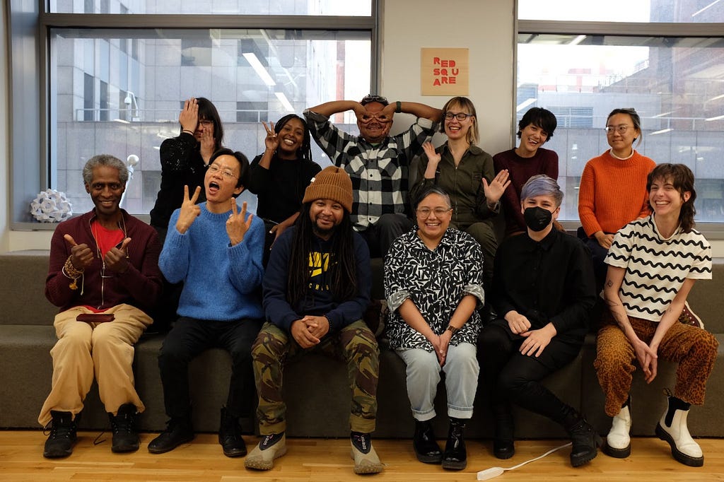 An image of our board of directors, advisors, staff, and community members at our NYU ITP 2024 Board Retreat. People are doing silly poses and smiling at the camera.