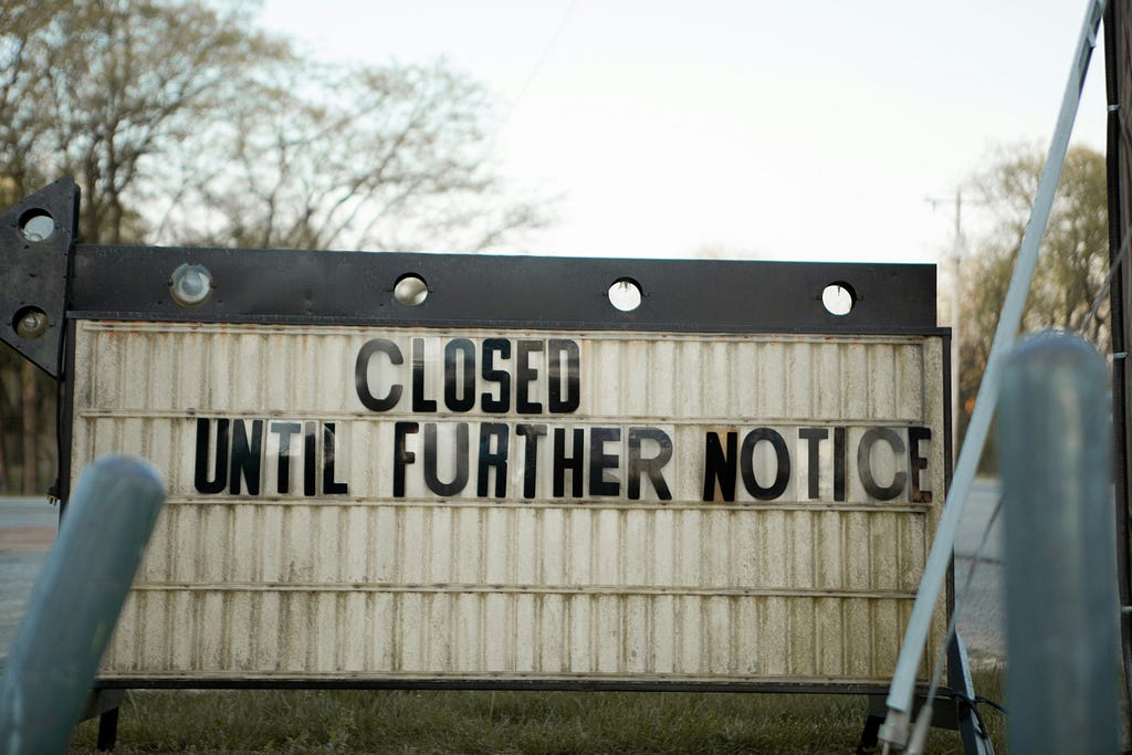 A static but changeable sign near the entrance to something (such as a worksite) reads, “Closed until further notice”.