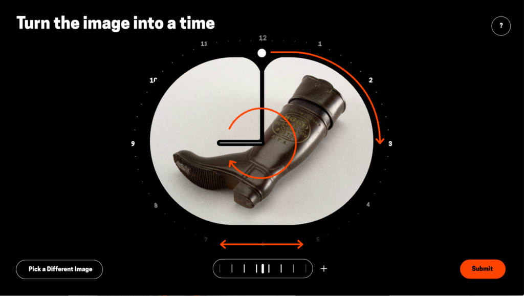 This image shows the process of turning a single image into a time. At the center is an oval shaped photo of a brown boot lying on its side surrounded by a black background. Superimposed on top of the boot are clock hands and orange arrows to indicate how the user can manipulate the image to identify the time that the image’s angles correspond to. On the upper left, text reads “Turn the image into a time”. On the bottom left and right buttons say “Pick a different image” and “submit”.
