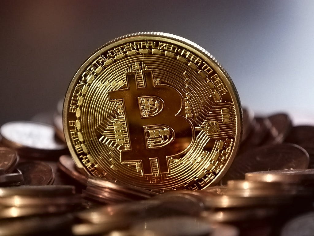 A golden coin representing Bitcoin