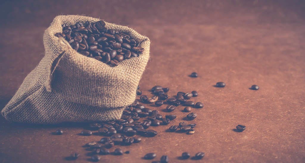 Coffee beans for caffeine mens skincare products