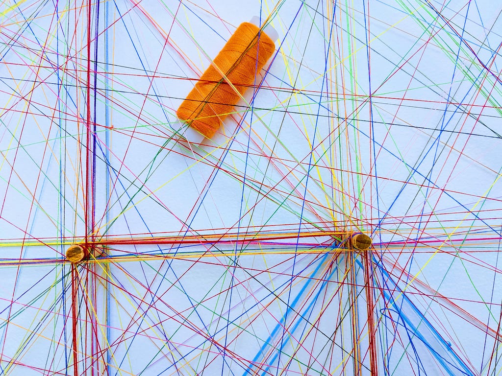 A network of colored string