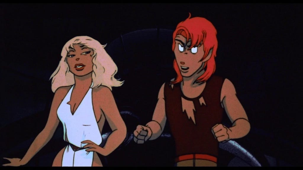 A still from Rock & Rule showing Omar, a mostly-human creature with a mouse’s nose and long red hair, and his counterpart Angel — also mostly human but with a mouse-nose, blonde hair and a white V-neck dress.