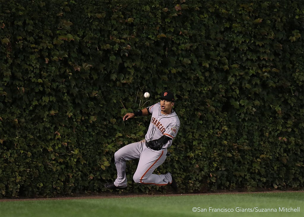 Gorkys Hernandez catches a fly ball in center field in the third inning.