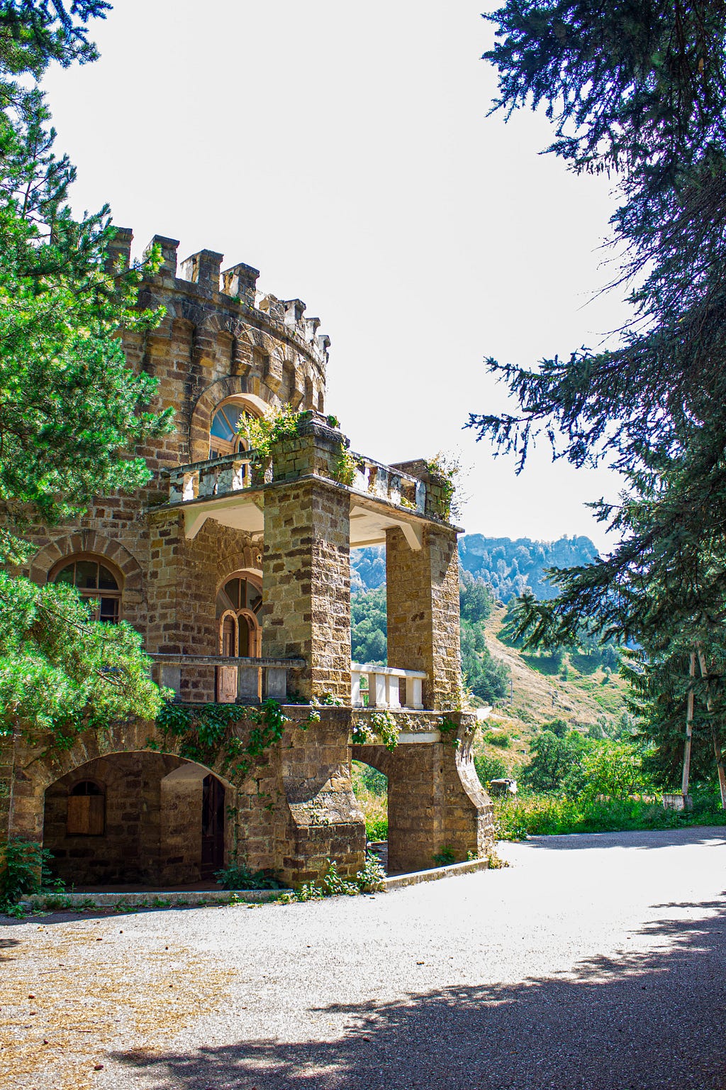 fancy brick built building with turrets and porticos