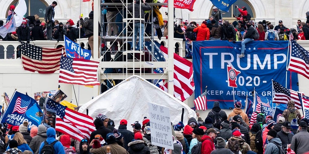 Trump supporters occupy the West Front of the Capitol and the inauguration stands on Wednesday, Jan. 6, 2021.