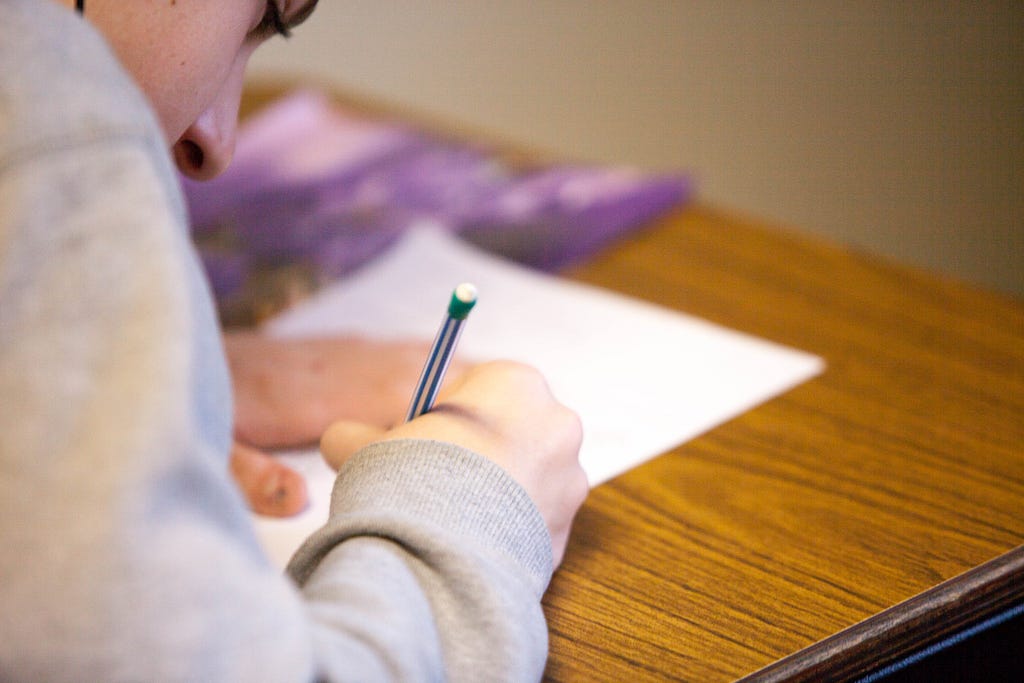 Child taking a test.