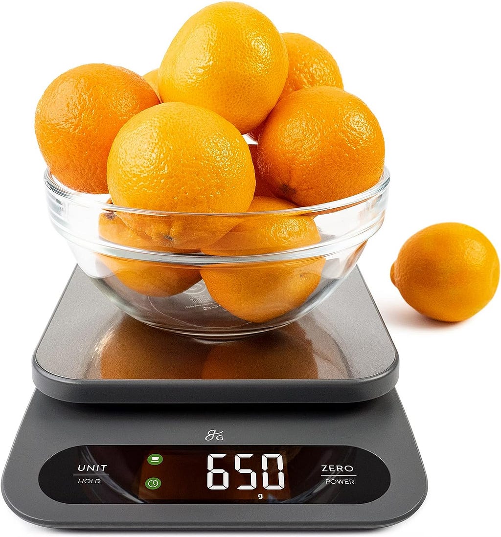 oranges in a bowl on a Digital Kitchen Scale: