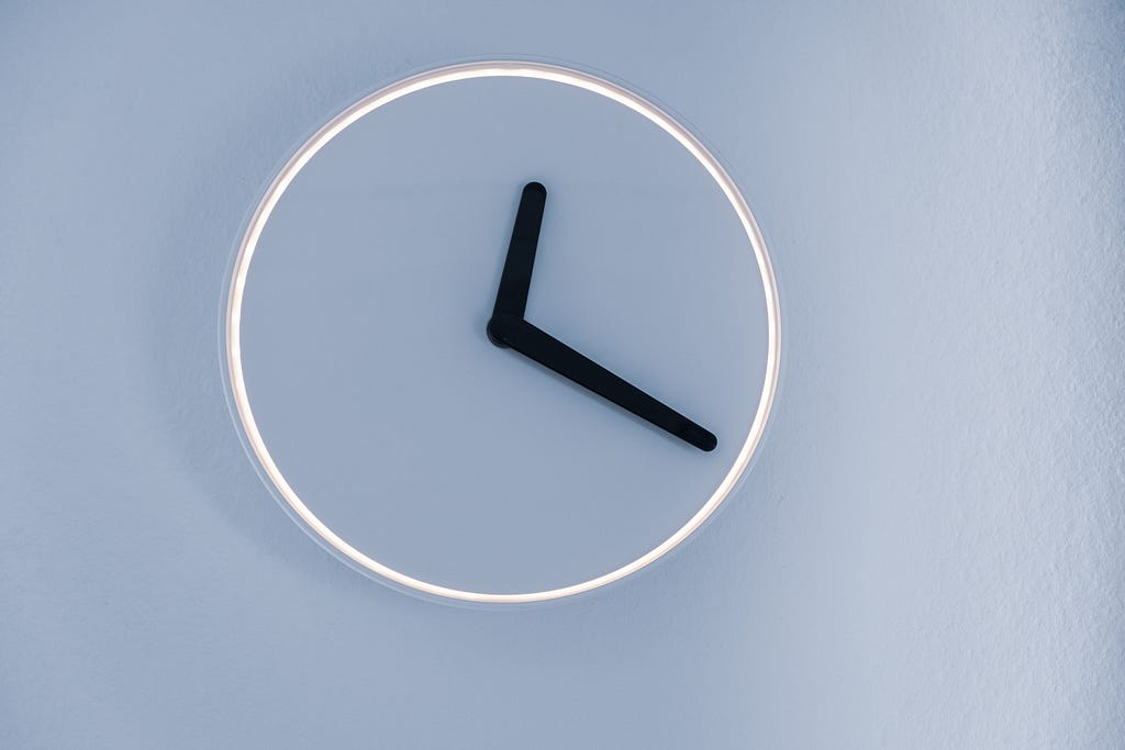 a clock with a white face.