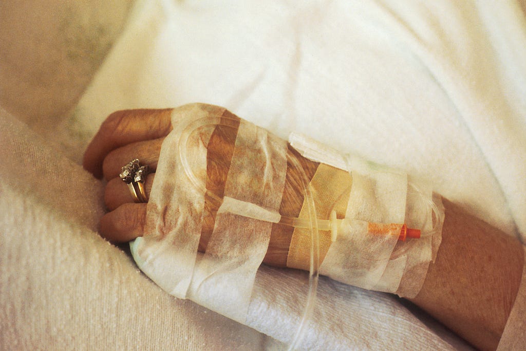 A chemotherapy patient receiving their chemotherapy drugs intravenously.