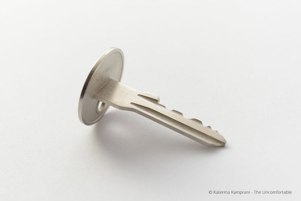 Artist Katerina Kamprani’s famous artwork of a key with an uncomfortable turning plate to illustrate visual discomfort