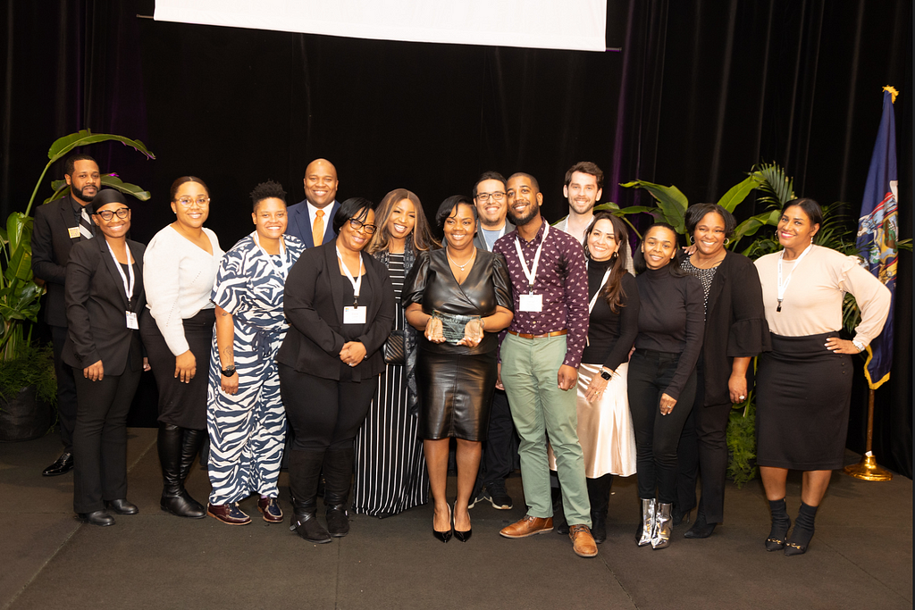 Group photo of PATH and NYC Opportunity Team accepting award