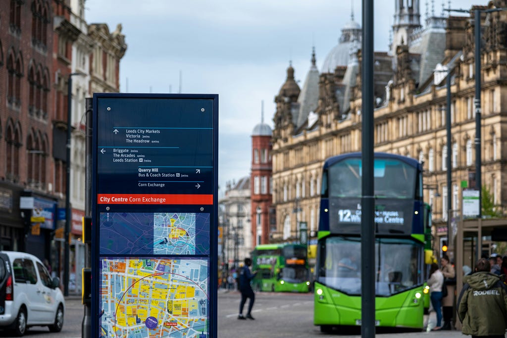 An image of buses stopping on Vicar Lane in the centre of Leeds.