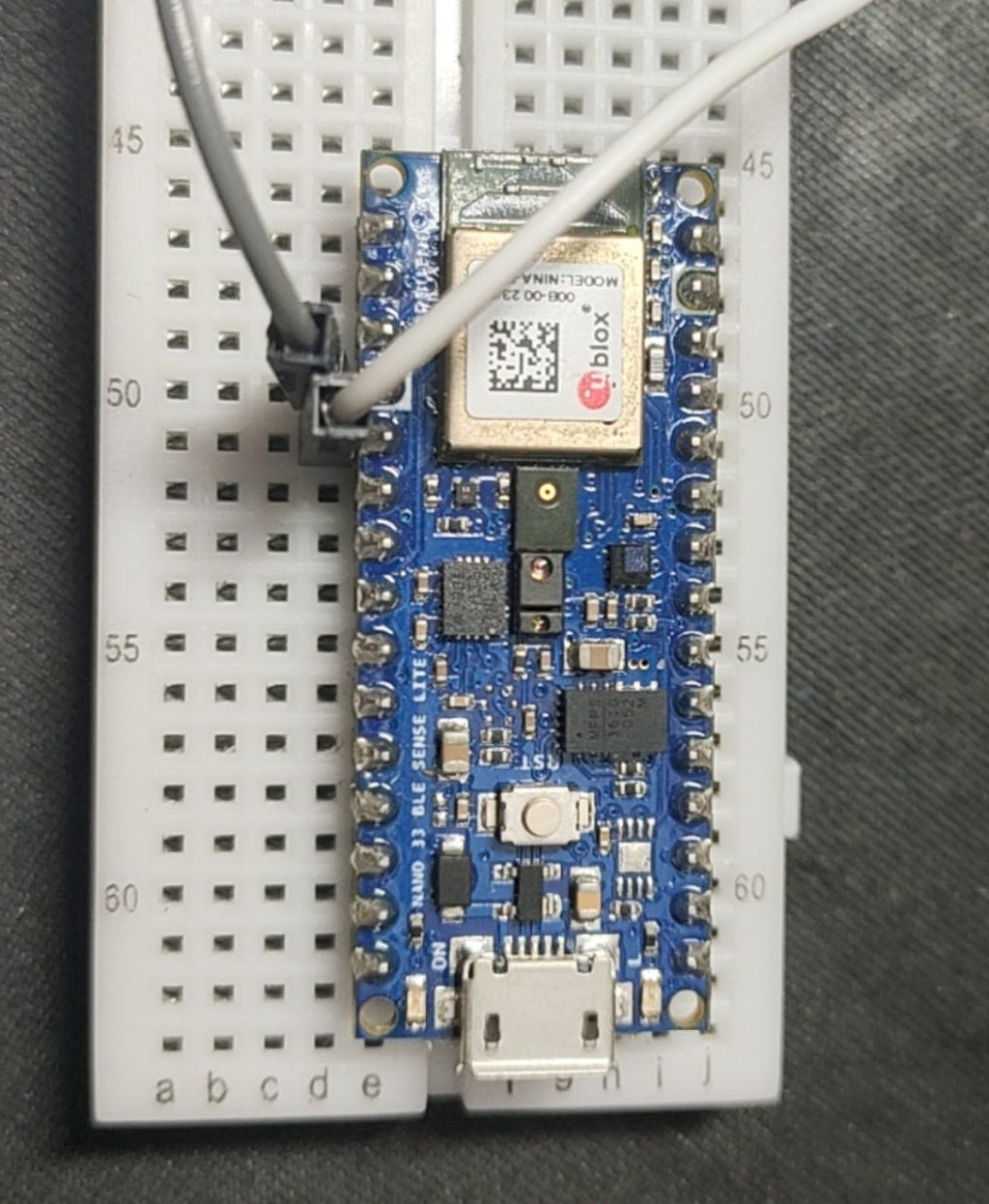 2 wires connected to GND pin (white layered) and D2 pin