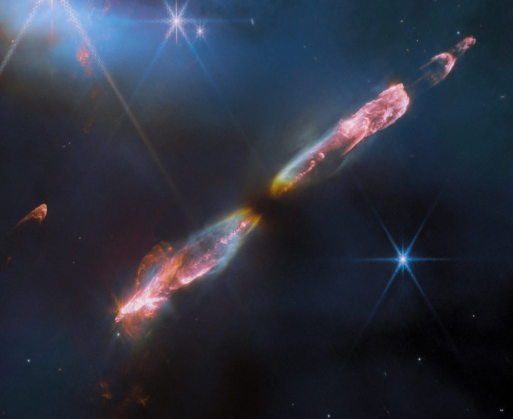 In the formation HH 211, jets of hydrogen and other gases bracket a newborn star (not visible).