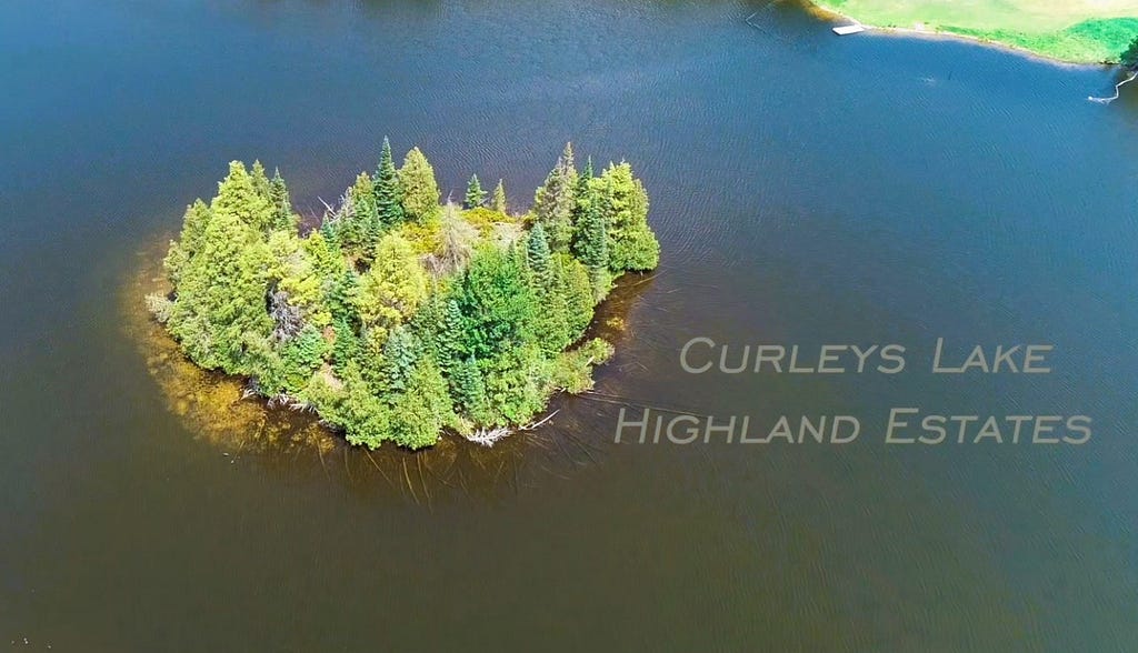 Curley Lake Highland Estates in Ontario, Canada has an island in the middle of the lake