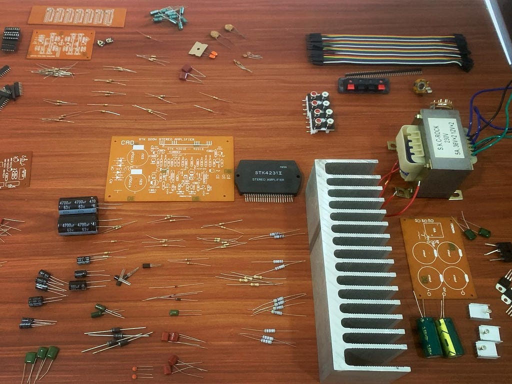 Components required for amplifier STK4231 based amplifier, LM1036 tone controller, KA2284 and LM324 based spectrum analyzer.