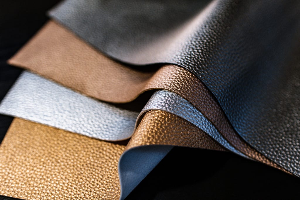 differently colored samples of leather material