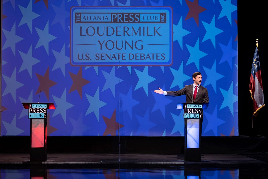 Democratic challenger Jon Ossoff takes questions from moderators without Incumbent Republican Senator David Perdue.