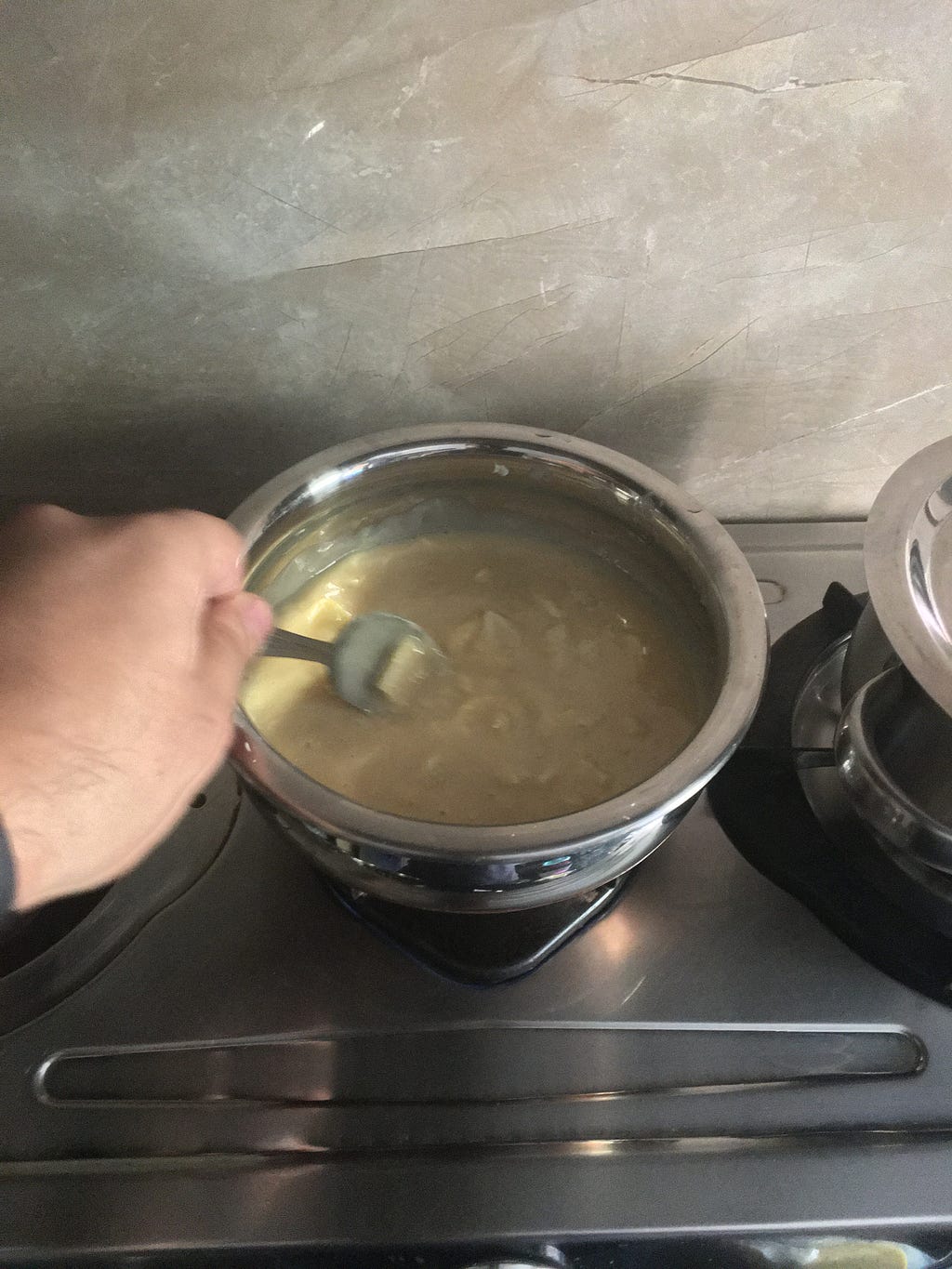 Milky Bar and Condensed Milk mixture heated in a bowl