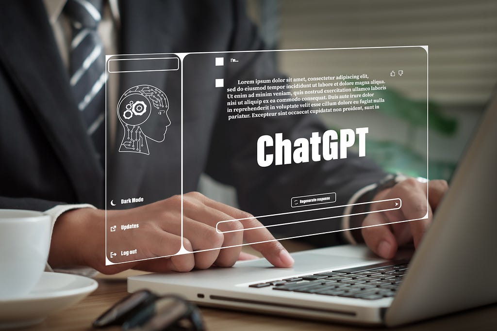 A man wearing a suit and typing on a laptop with the words “ChatGPT” floating above it