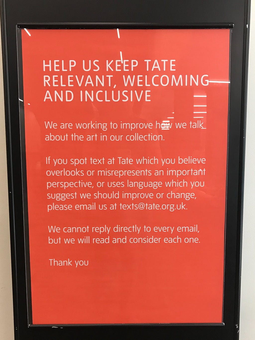 A text-only sign from the Tate Museum with the headline: Help Us Keep Tate Relevant, Welcoming and Inclusive.