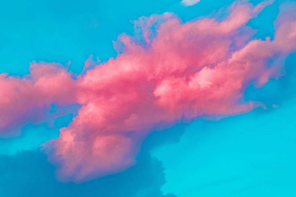 Blue sky with pink clouds