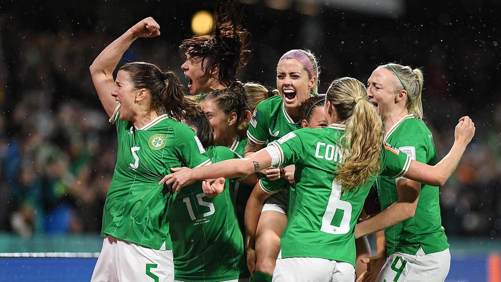 photo of Republic of Ireland players celebrating scoring a goal