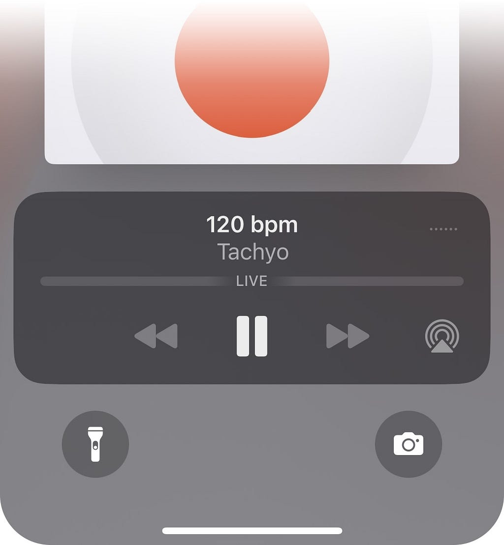 iPhone lock screen with media player controls for Tachyo