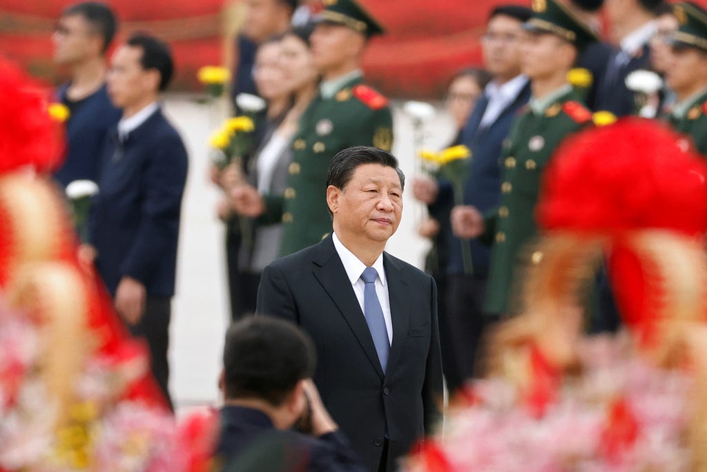 Chinese President Xi Jinping arrives for a ceremony in Tiananmen Square in Beijing, China September 30, 2021. Photo by Carlos Garcia Rawlins/Reuters