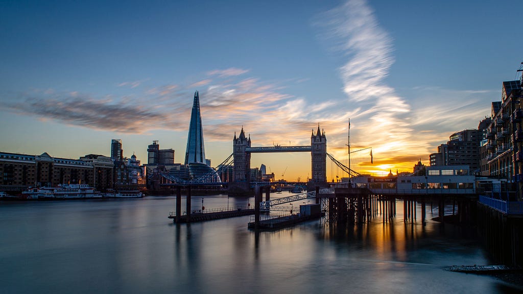 A beautiful sunset view looking over the Thames towards Tower Bridge and The Shard in London