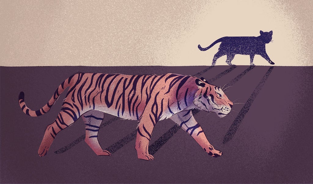 An illustration of a tiger with a cat shadow in the background. The color palette is in pinks and blues. The tiger’s stripes show a hidden ‘UX’.