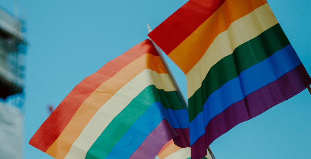 Two LGBTQI+ flags