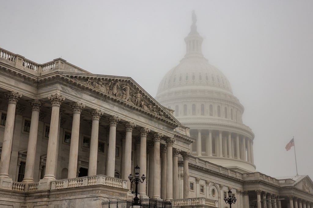 Thick fog envelopes the U.S. Capitol dome behind the U.S. House of Representatives on 4 November 2022 in Washington, DC. Photo by Samuel Corum/Getty Images