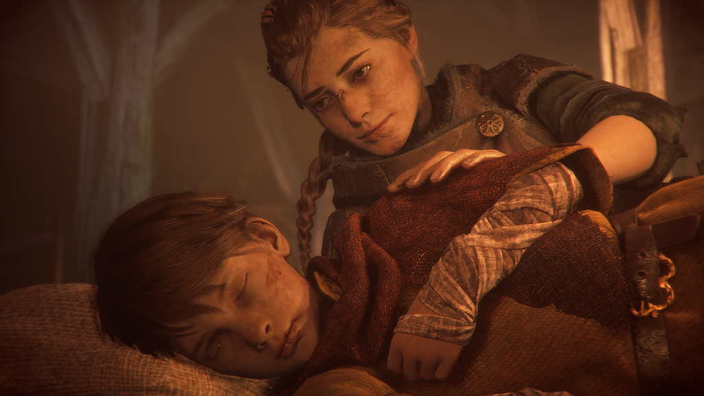 A screenshot from A Plague Tale: Innocence. A young girl, Amicia, is behind her younger brother, Hugo, who is sleeping. She places a hand on his shoulder.