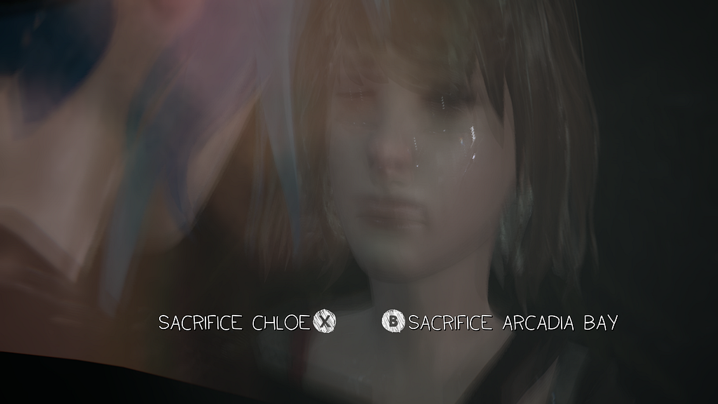 A blurry image of Max, tear and rain-soaked, with “Sacrifice Chloe” and “Sacrifice Arcadia Bay” displayed as choices on the screen. We see a bit of Chloe in front of the camera, facing Max, strands of her blue hair visible.