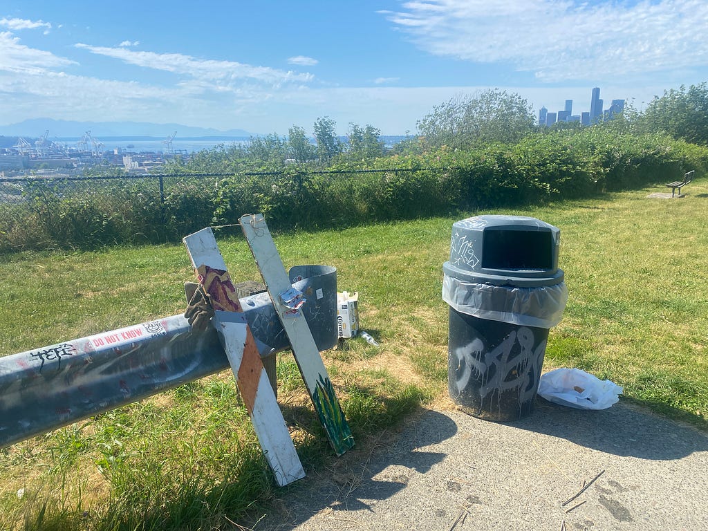 trash sculpture with seattle skyline